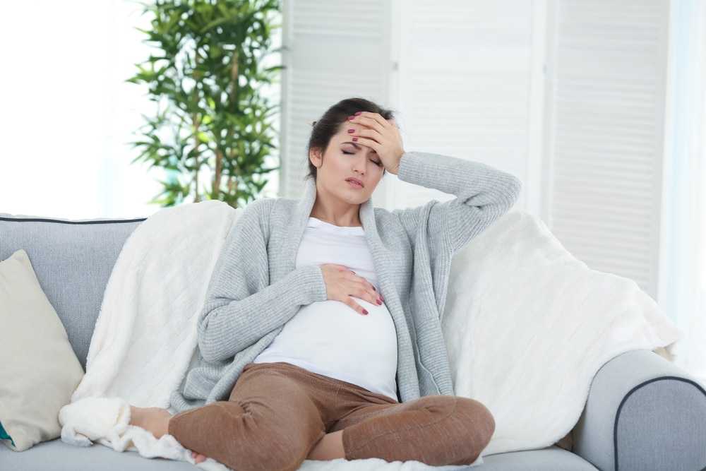 Почему болит и тянет низ живота при беременности?